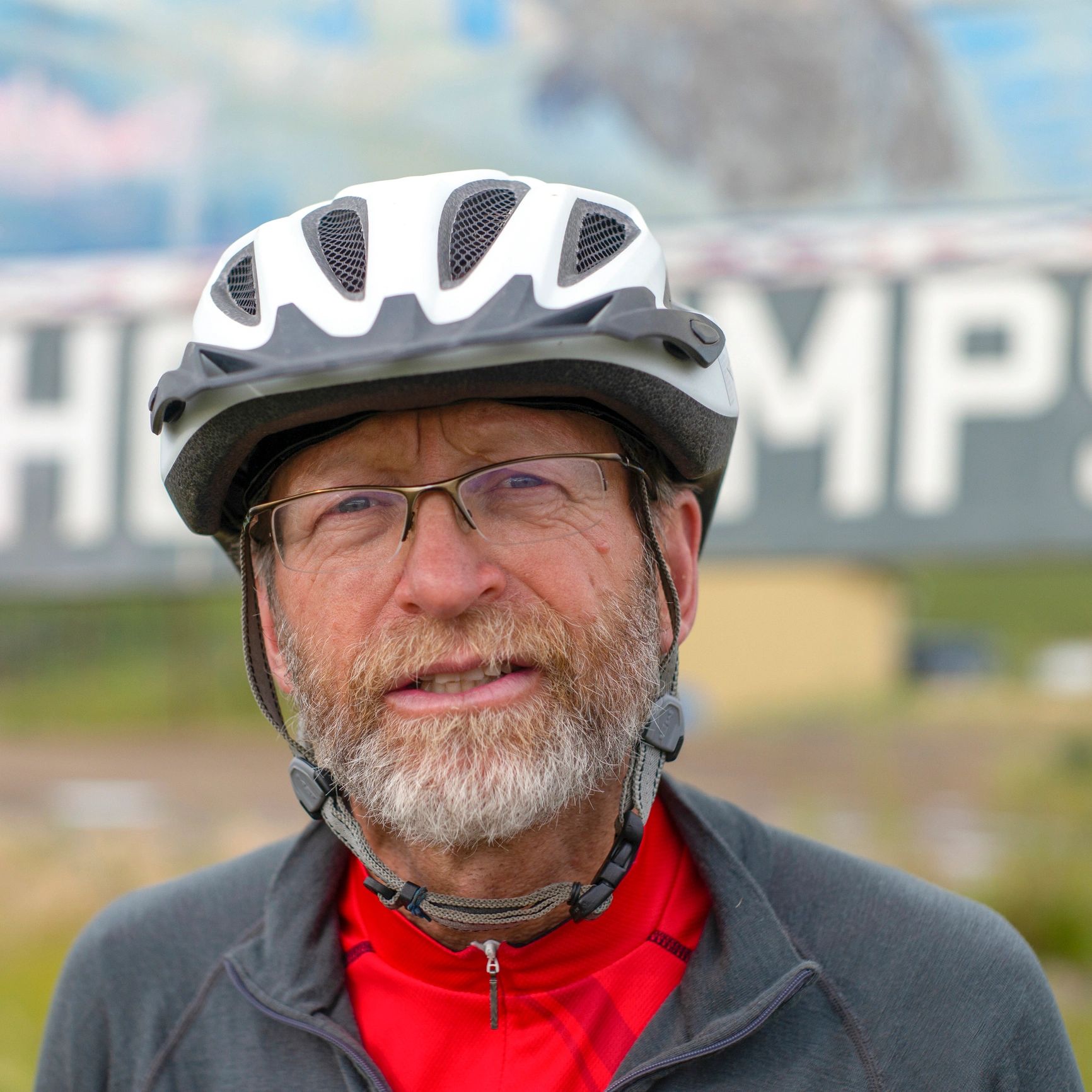 Portrait of a cyclist wearing a helmet