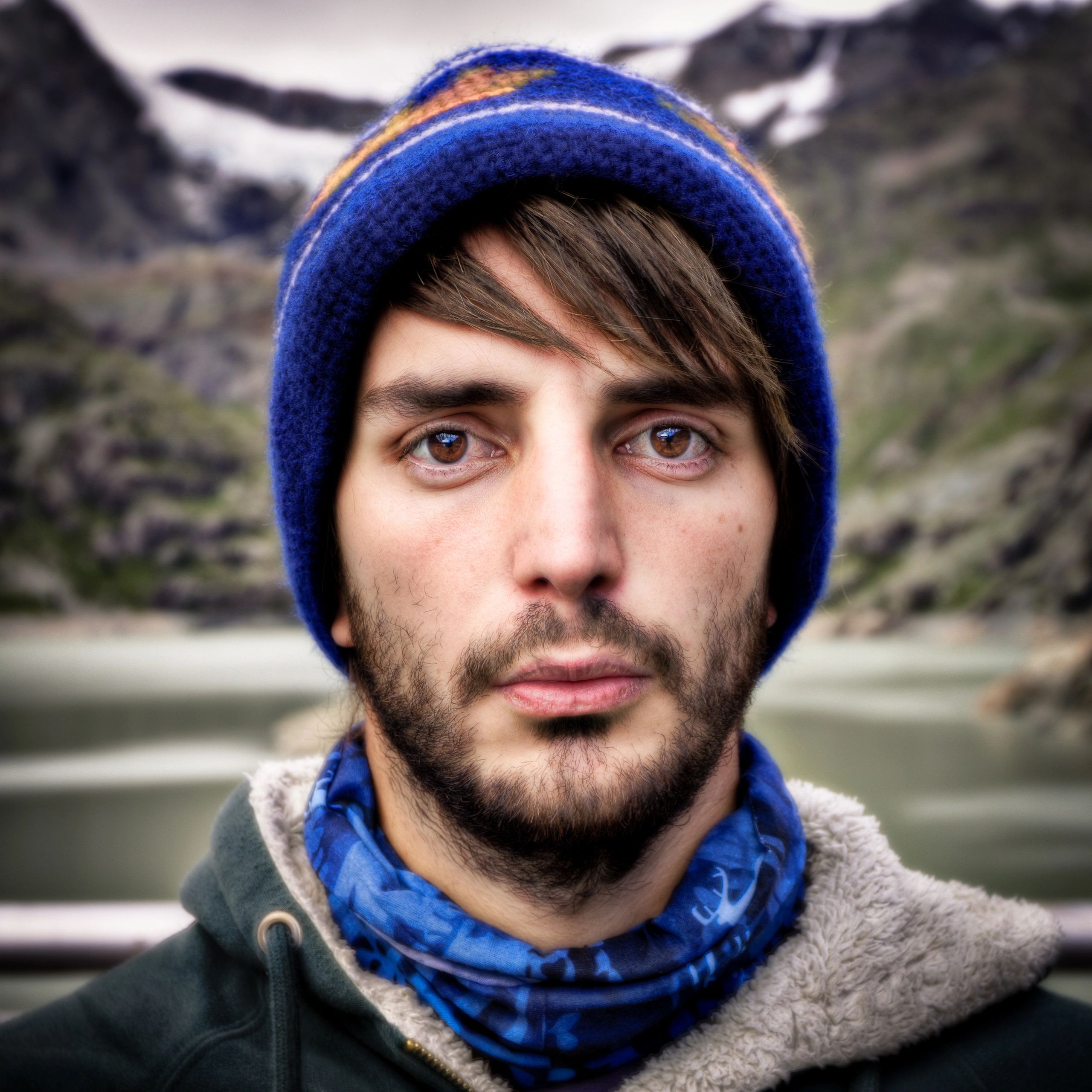 Portrait of a rider outdoors with mountains in the background